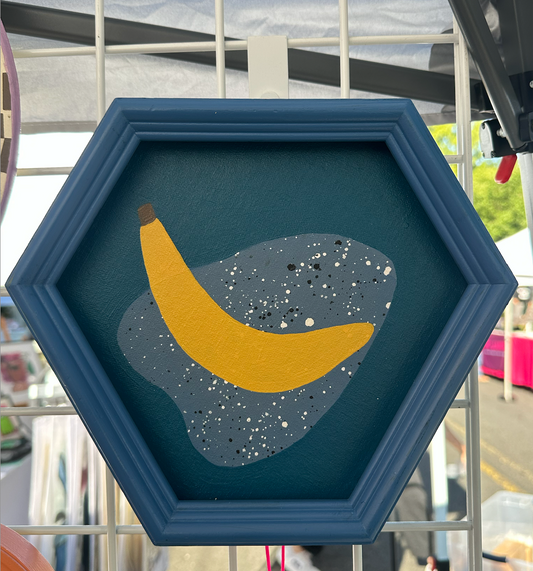 Banana in blue hexagon
